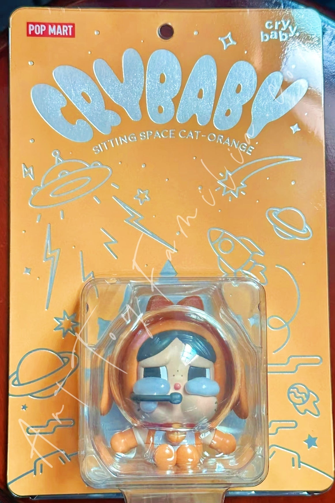 crybaby-sitting-space-cat-orange-POP Mart Crybaby
